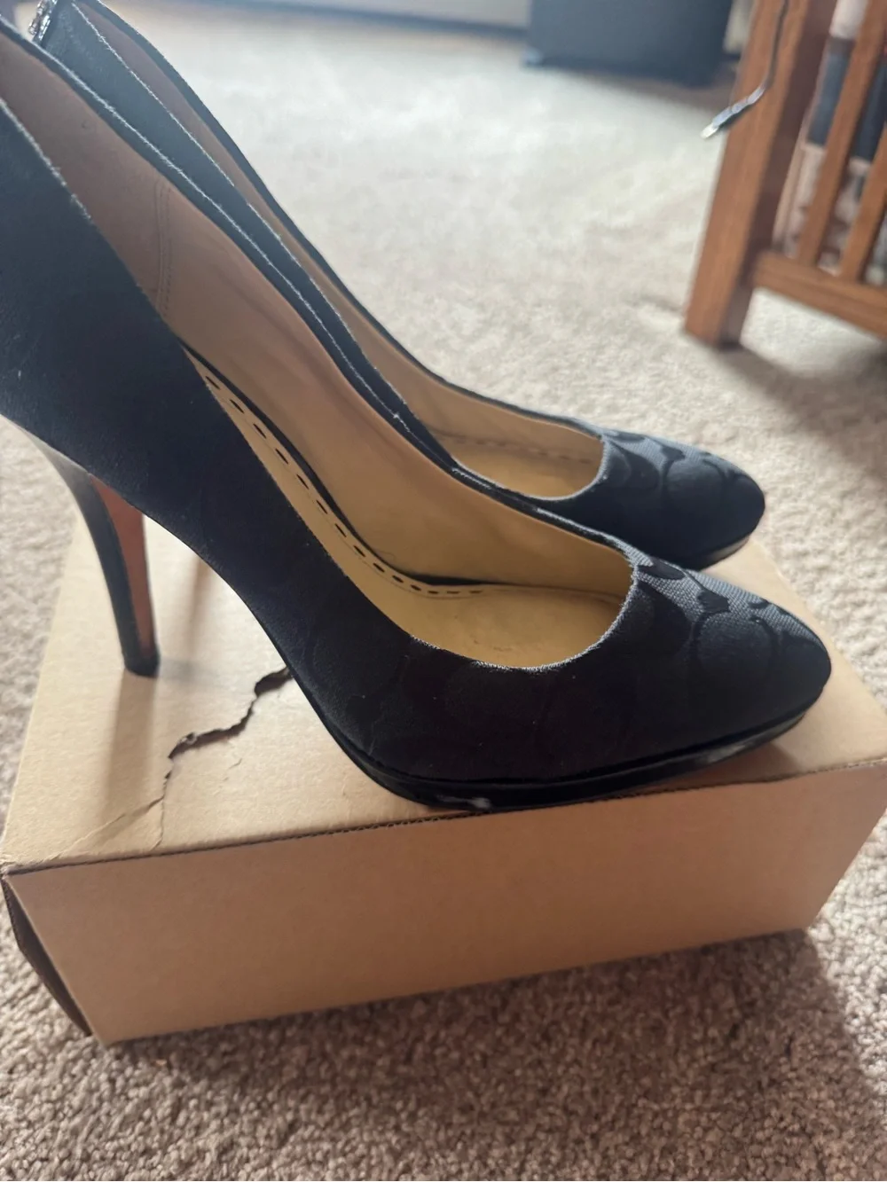 Coach Black Signature Canvas Pointed Toe Pumps, with Pattern leather detailing.